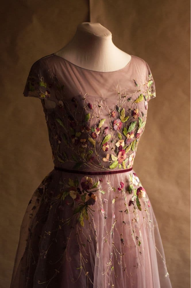the bodice of an embroidered dress