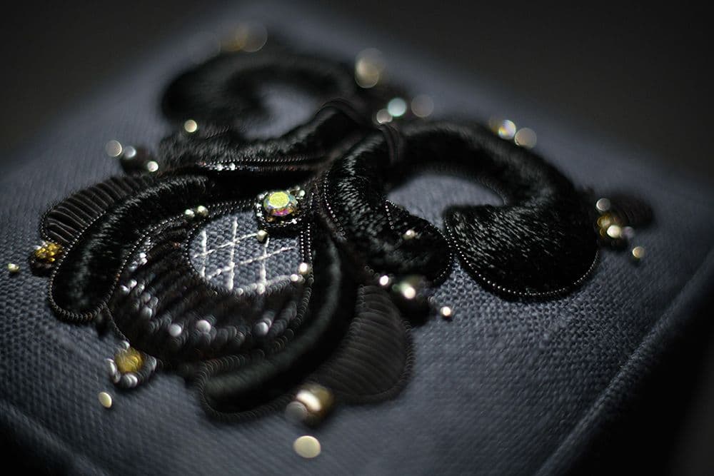 a close-up to a hand-embroidered jewellery box decorated with high relief embroidery