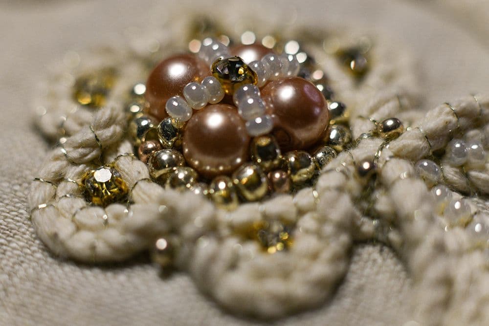 a close-up to a hand-embroidered jewellery box decorated with high relief embroidery