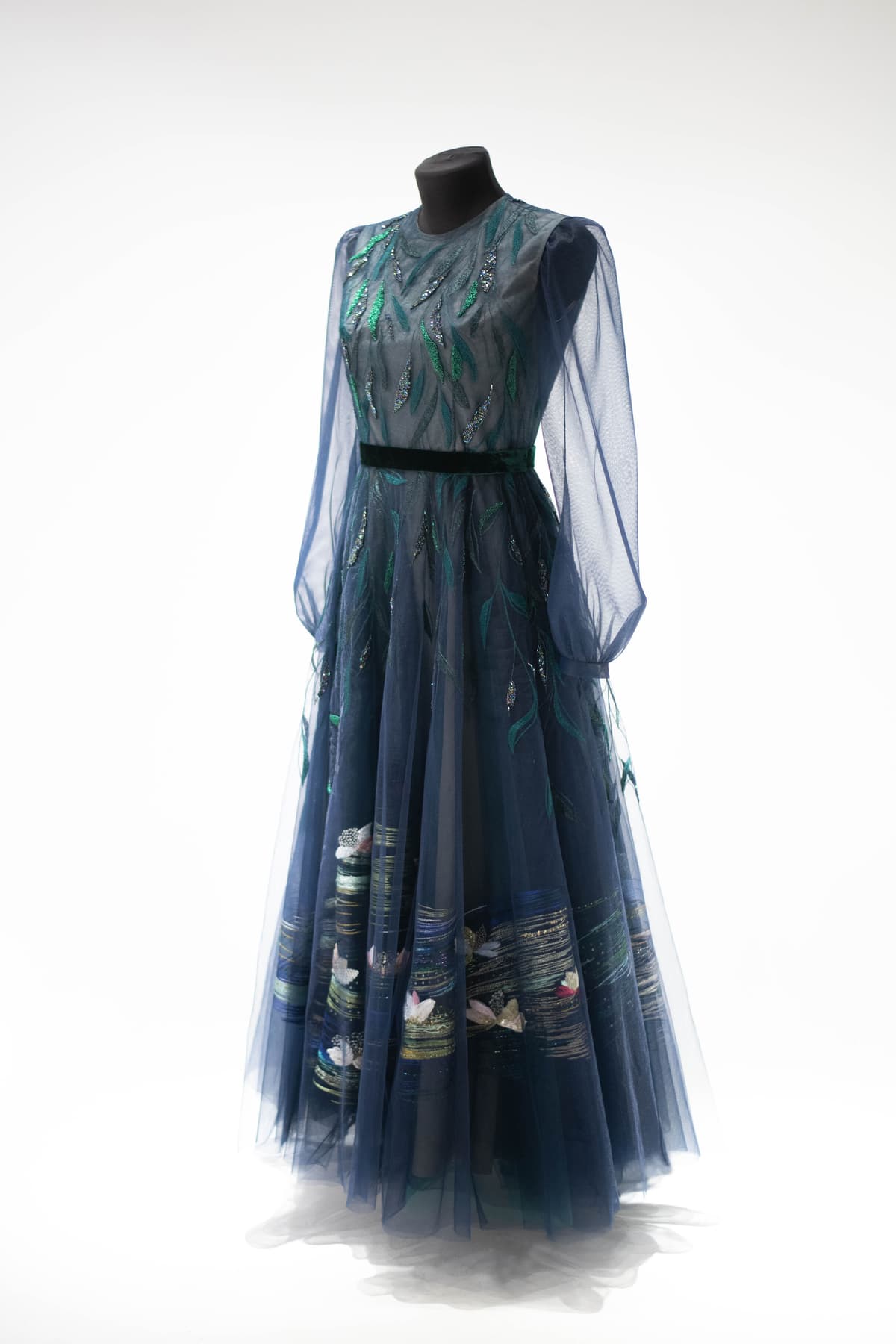 a full-length embroidered dress