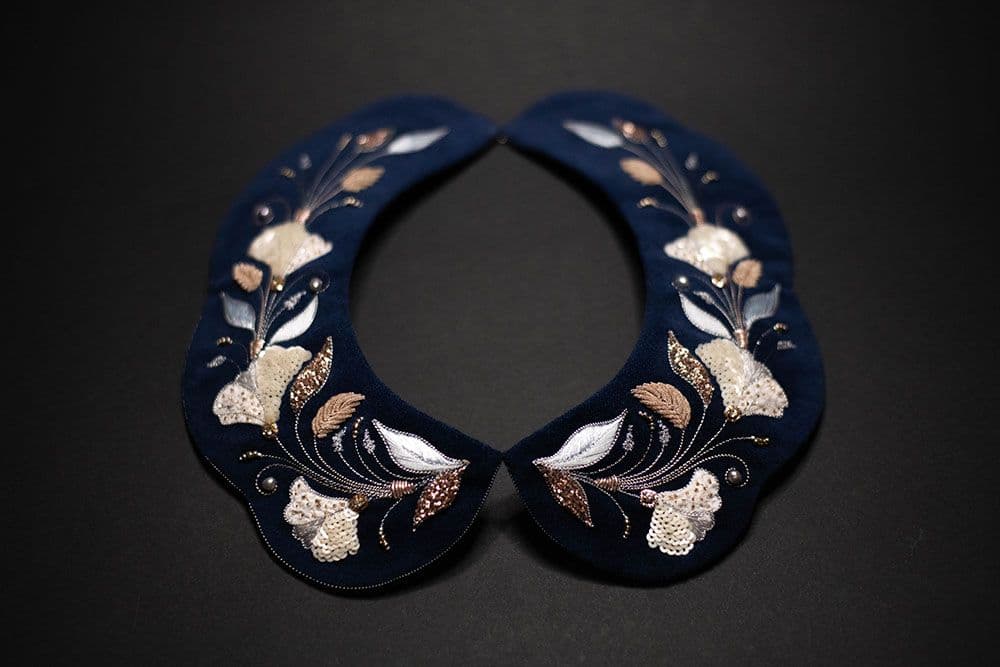 a final look to the embroidered collar