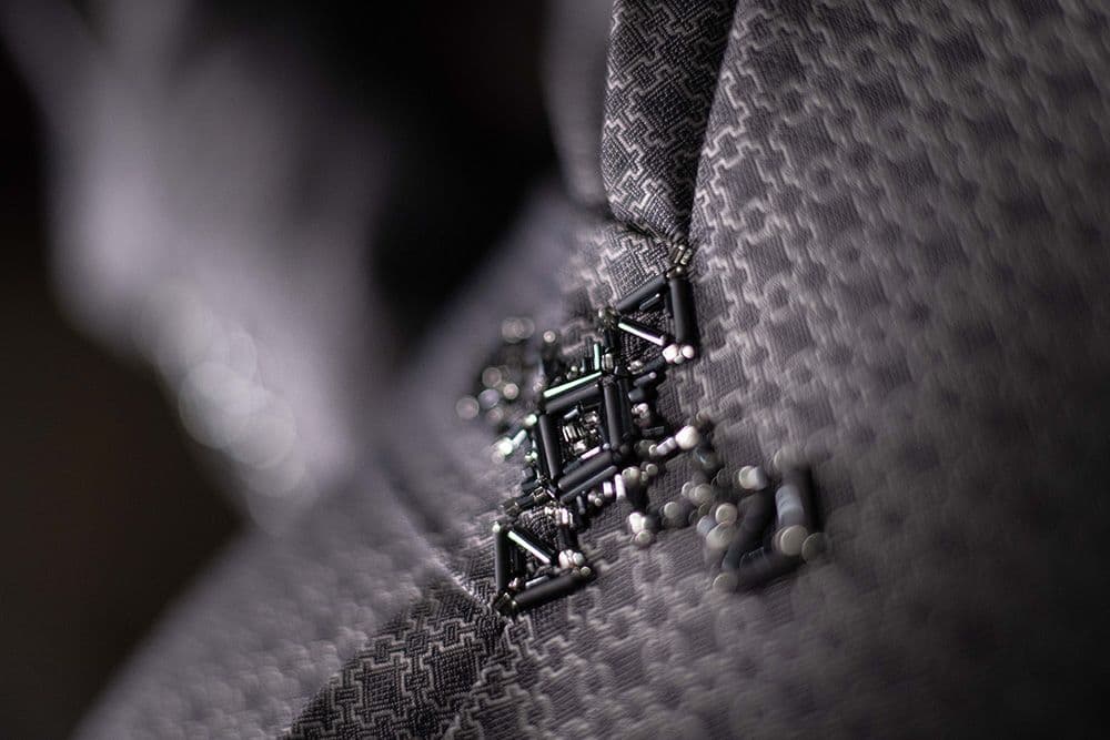 a close up on to the embroidered dress