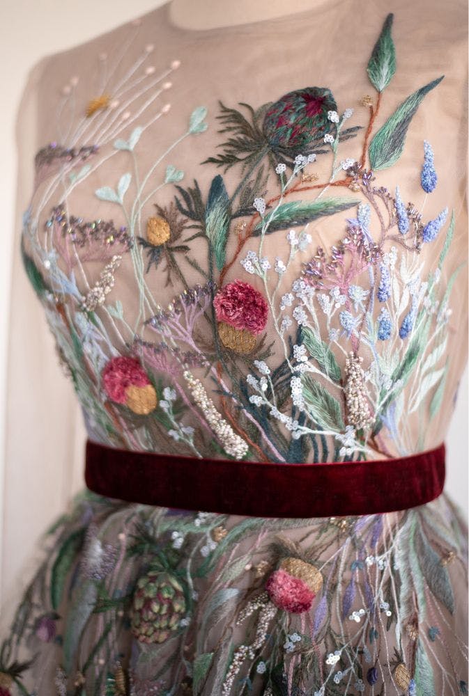 the bodice embroidered with herbal design