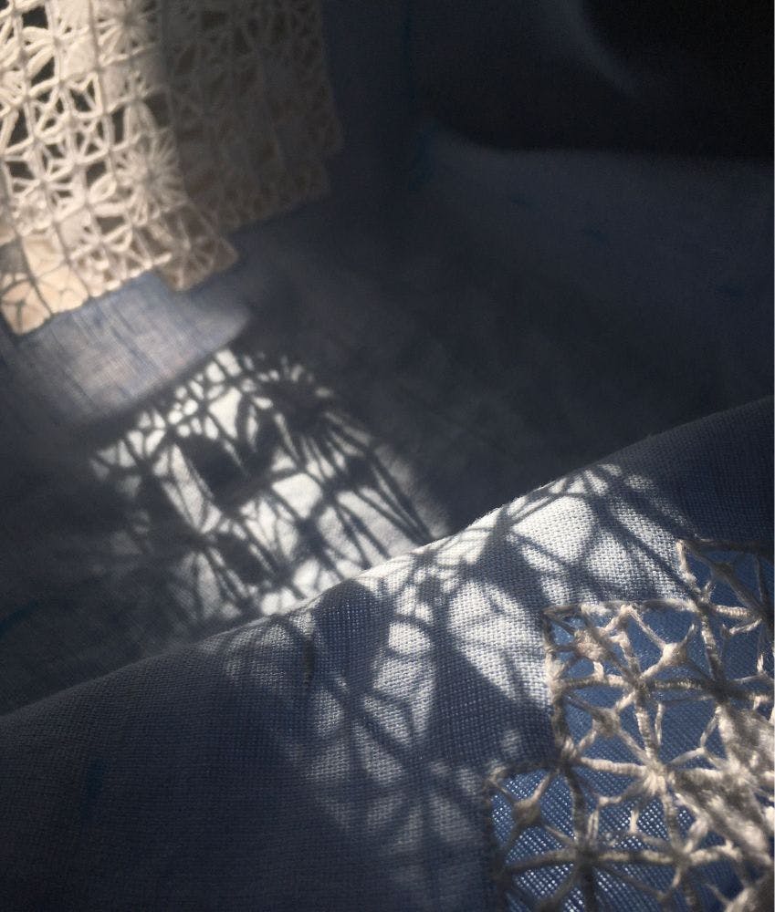 the trace sun beams leave going through the needle-lace work