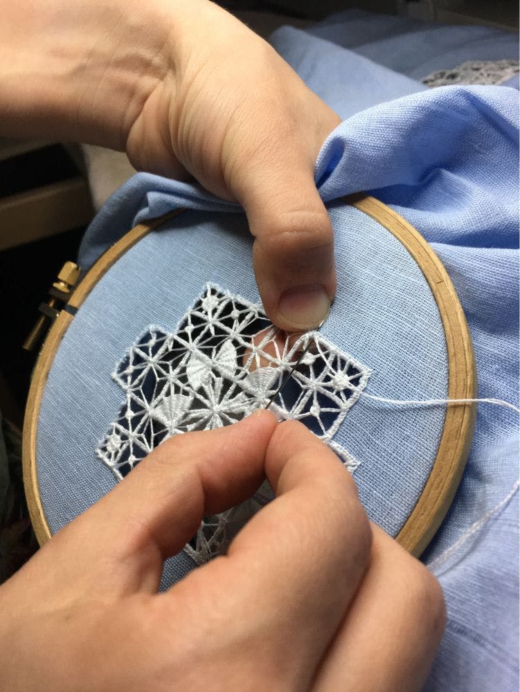 stitching the needle-lace design