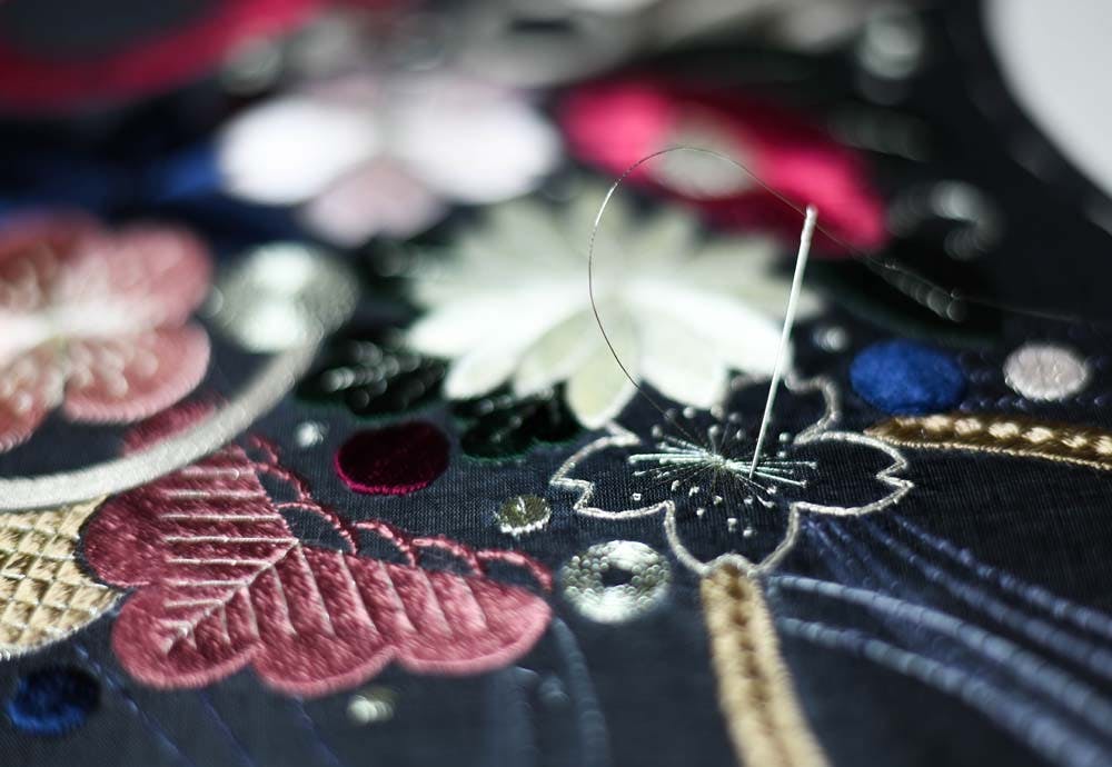a closeup of embroidered chrysanthemum