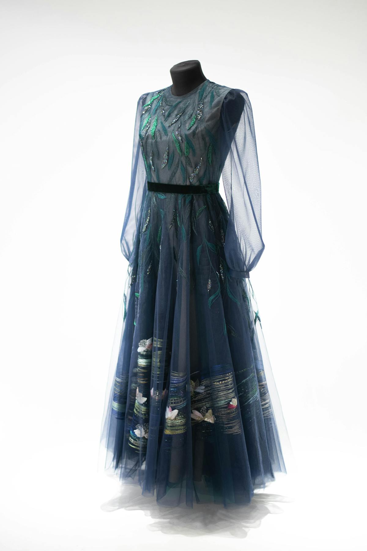 a full-length embroidered dress