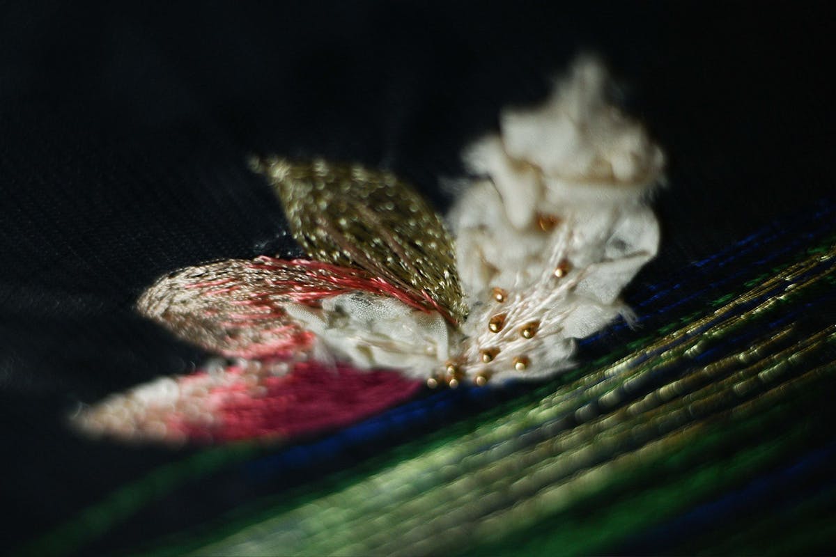 a close-up of the embroidered water lily